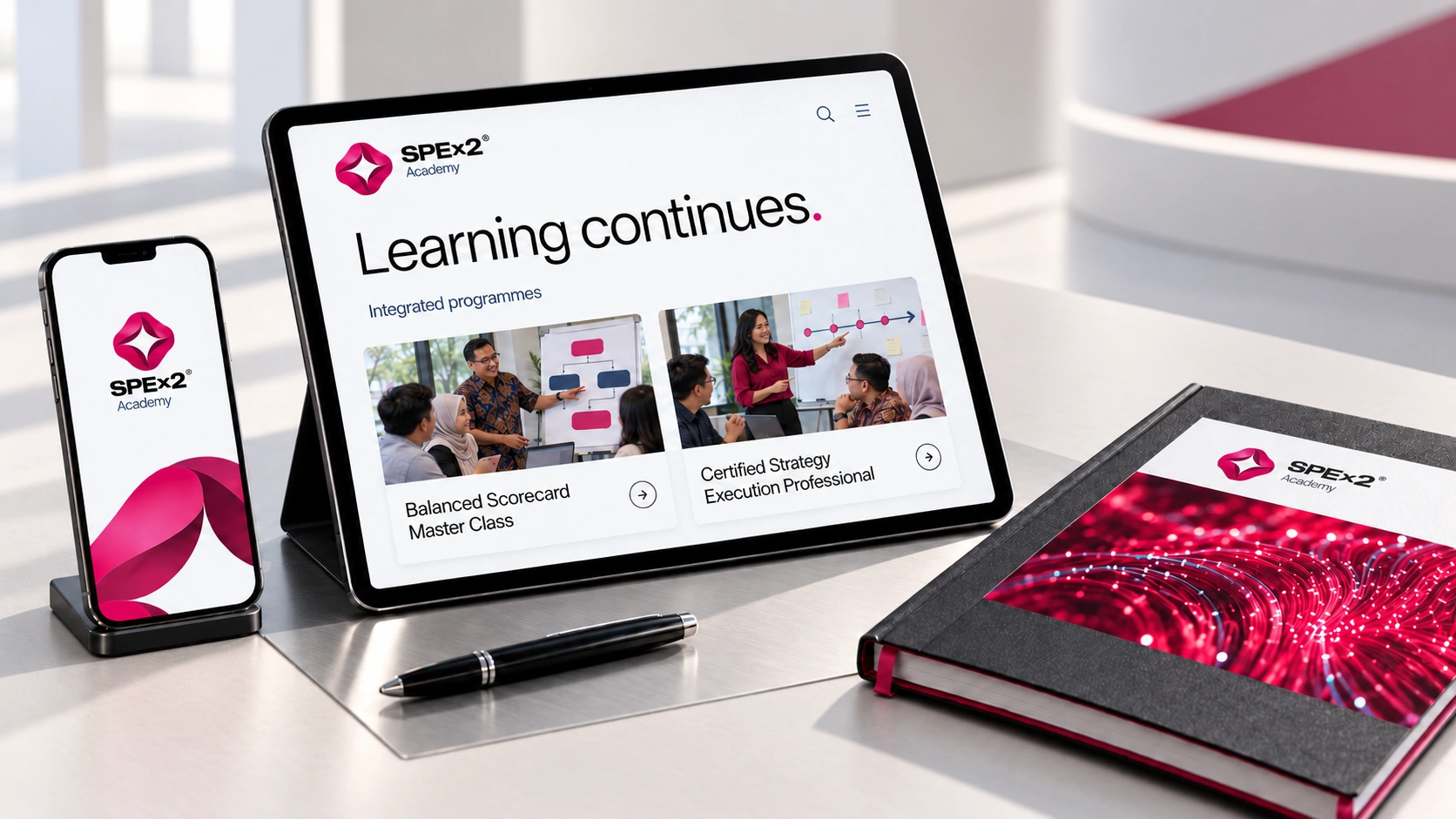 Academy digital learning mockup with relevant course photographs, original branded notebook and clean ivory surroundings.