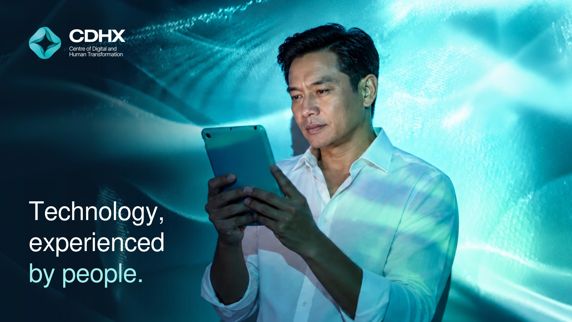Technology, experienced by people. The original man using a tablet shown larger, with the CDHX logo and headline clear at left.